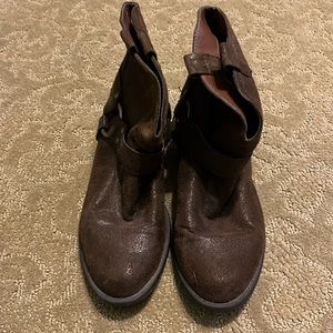 Brown faux suede boots.